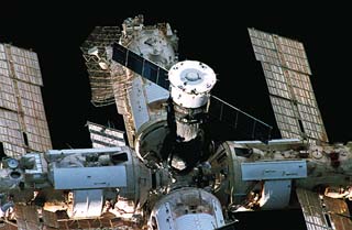 View of the Soyuz spacecraft docked to the last hatch on the docking node.